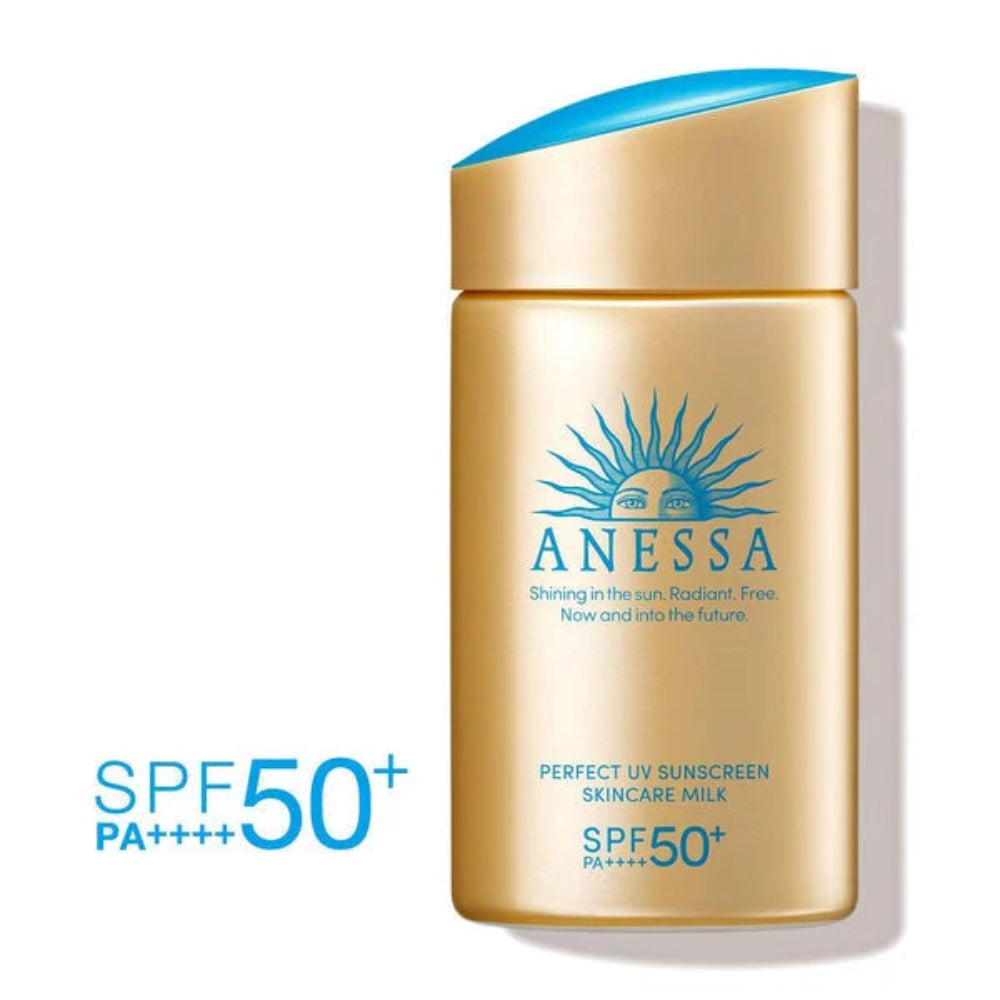 Anessa sunscreen bottle with blue cap on a white background