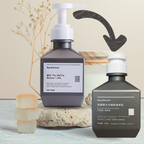 Two bottles of 'Royal Refined' skincare products on a neutral background with decorative elements.