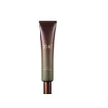 Skincare tube with brown and green color scheme on a white background